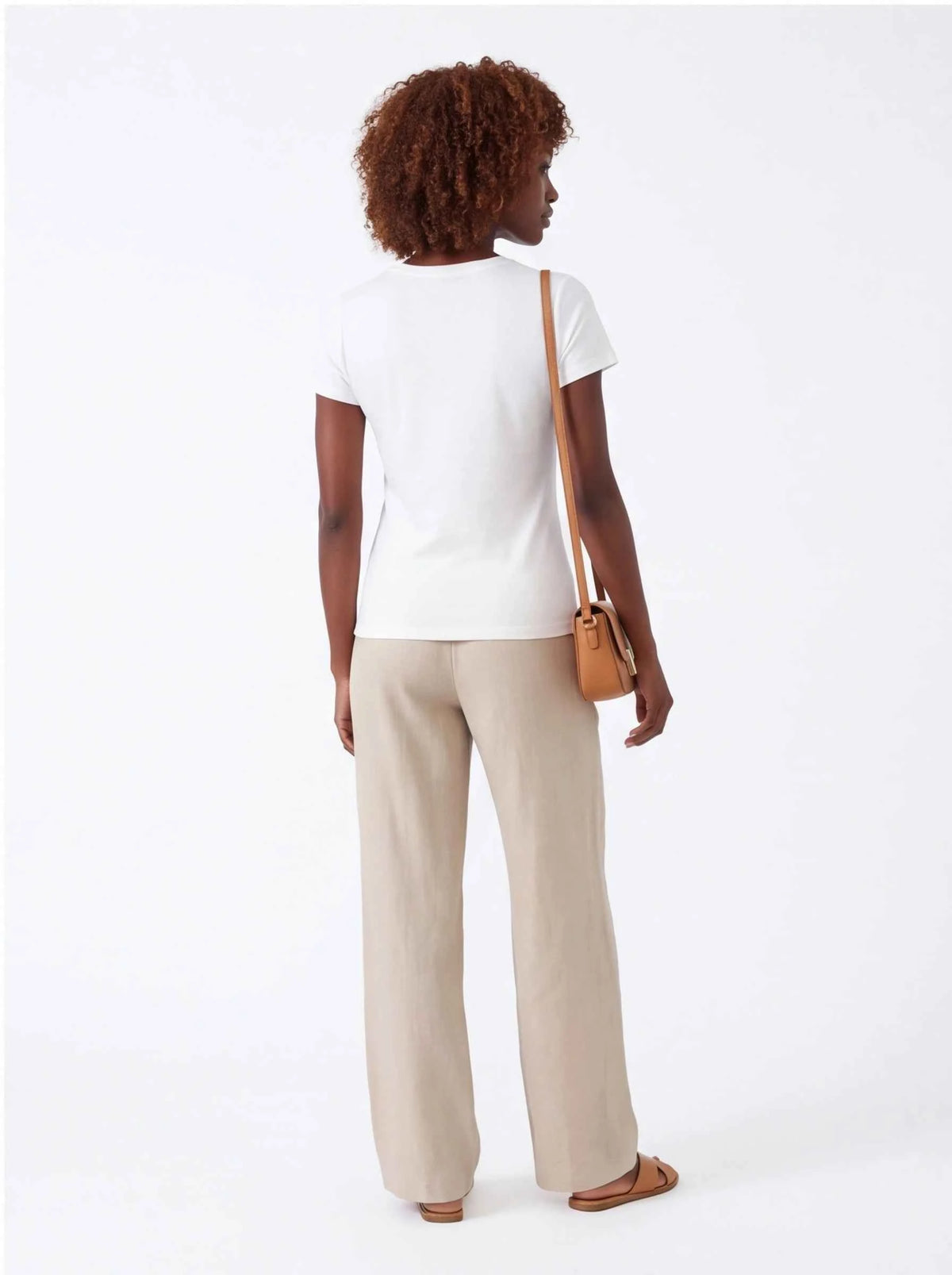 White T-shirt with crew neck and short sleeves, back view no front graphic