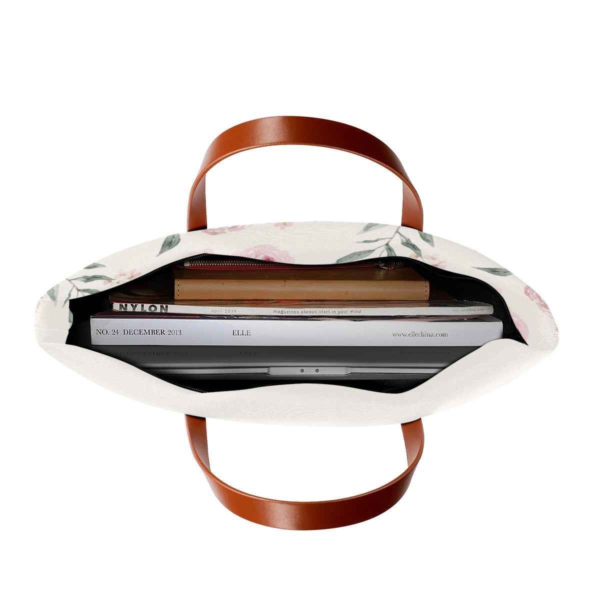 White floral tote bag with brown handles, open top showing inner pocket