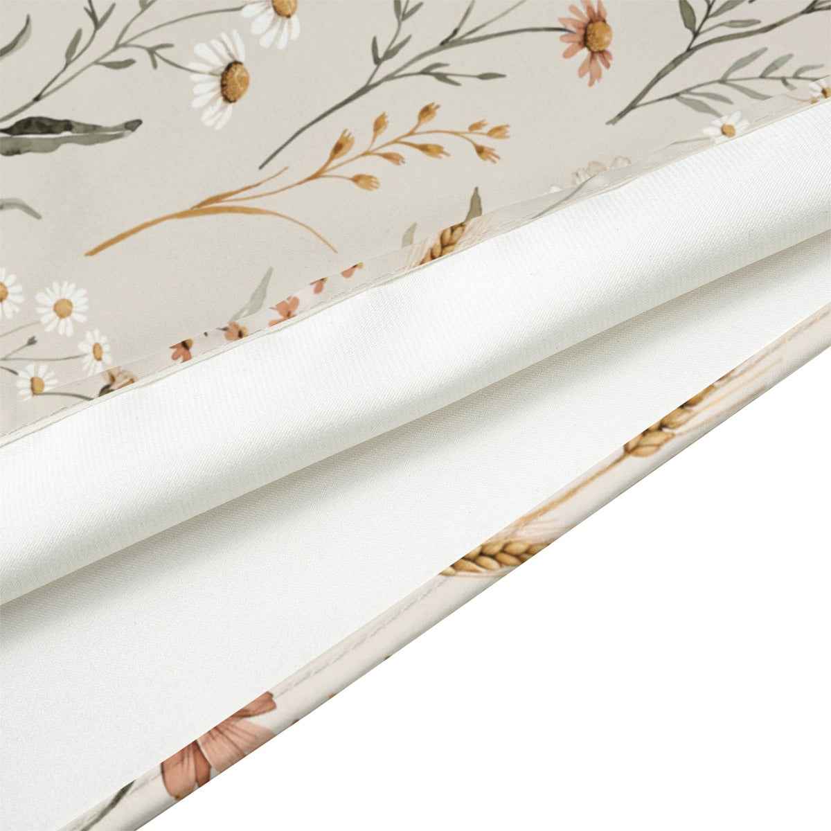 White silk bandana with botanical floral print in gold and tan, folded edge visible