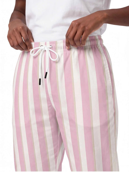 Pink and white striped jogger pants close-up: drawstring waistband