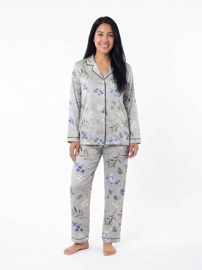 Women's satin lounge pajama set with blue floral print top and matching trousers, light