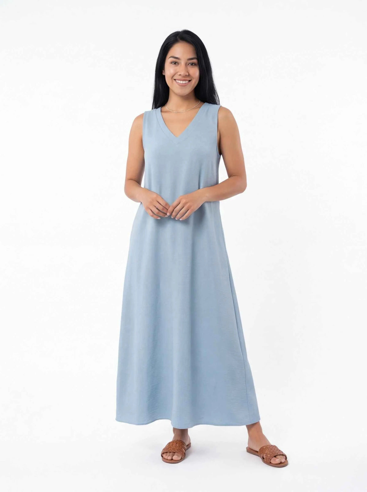 Light blue sleeveless V-neck maxi dress with soft, draped skirt