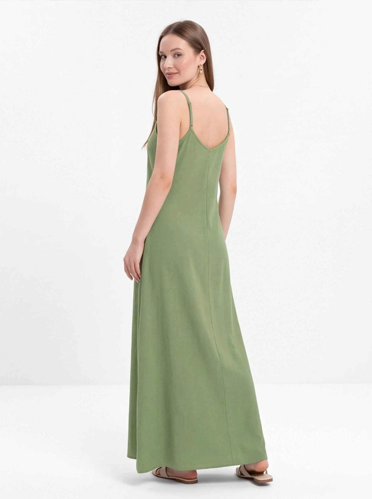 Olive green spaghetti strap maxi dress, angled view of V-neck and length