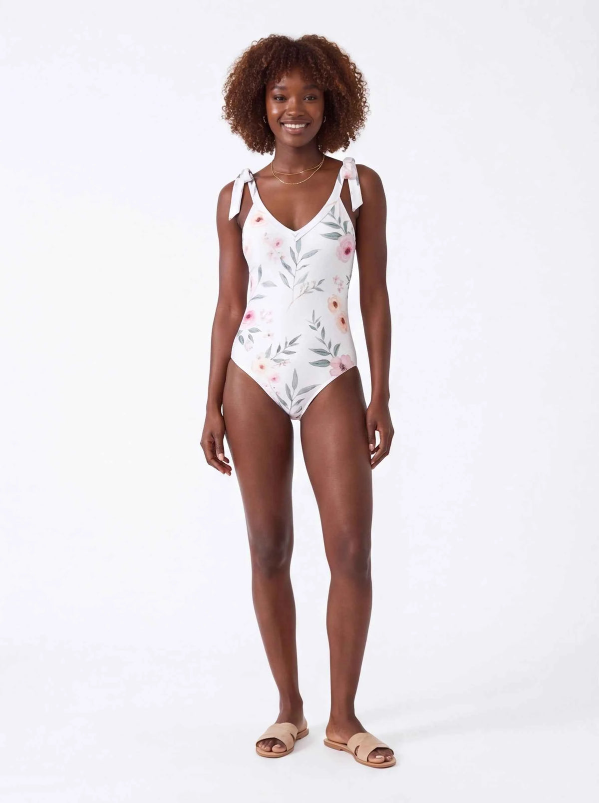 Floral tie-shoulder one-piece swimsuit with pink rose and leaf print, white base