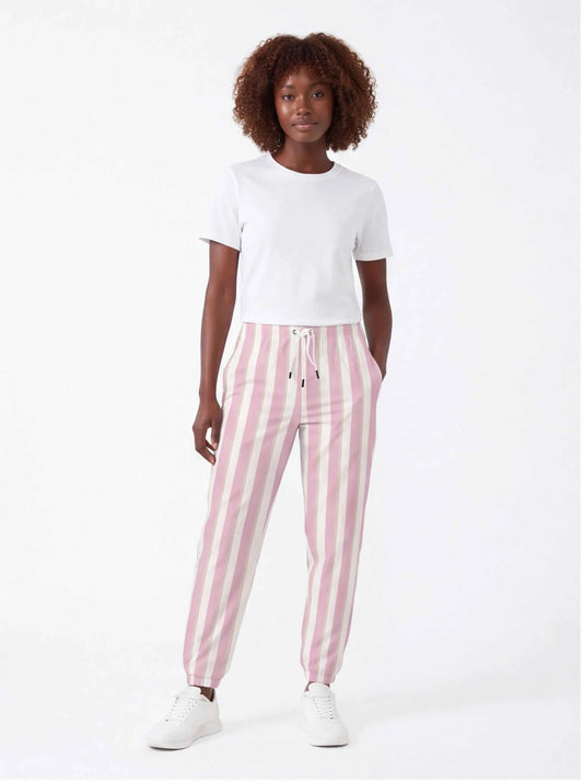 Pink and white striped cotton jogger pants with drawstring waist and tapered legs