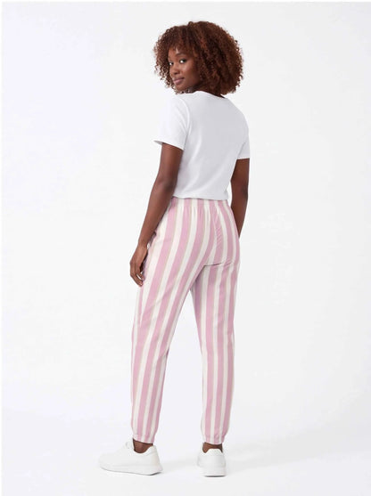 Pink and white striped cotton jogger pants, side view with drawstring waist