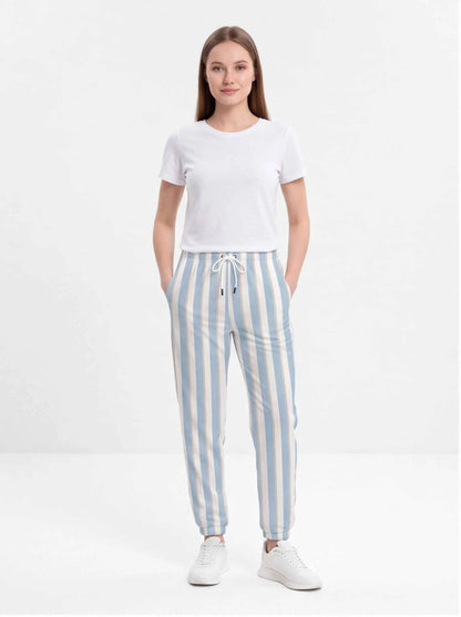 Blue and white striped cotton jogger pants with drawstring waist and tapered cuffs