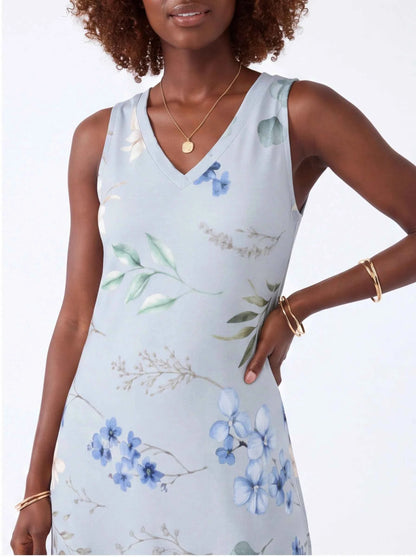 White sleeveless V-neck maxi dress bodice with blue floral and green leaf print