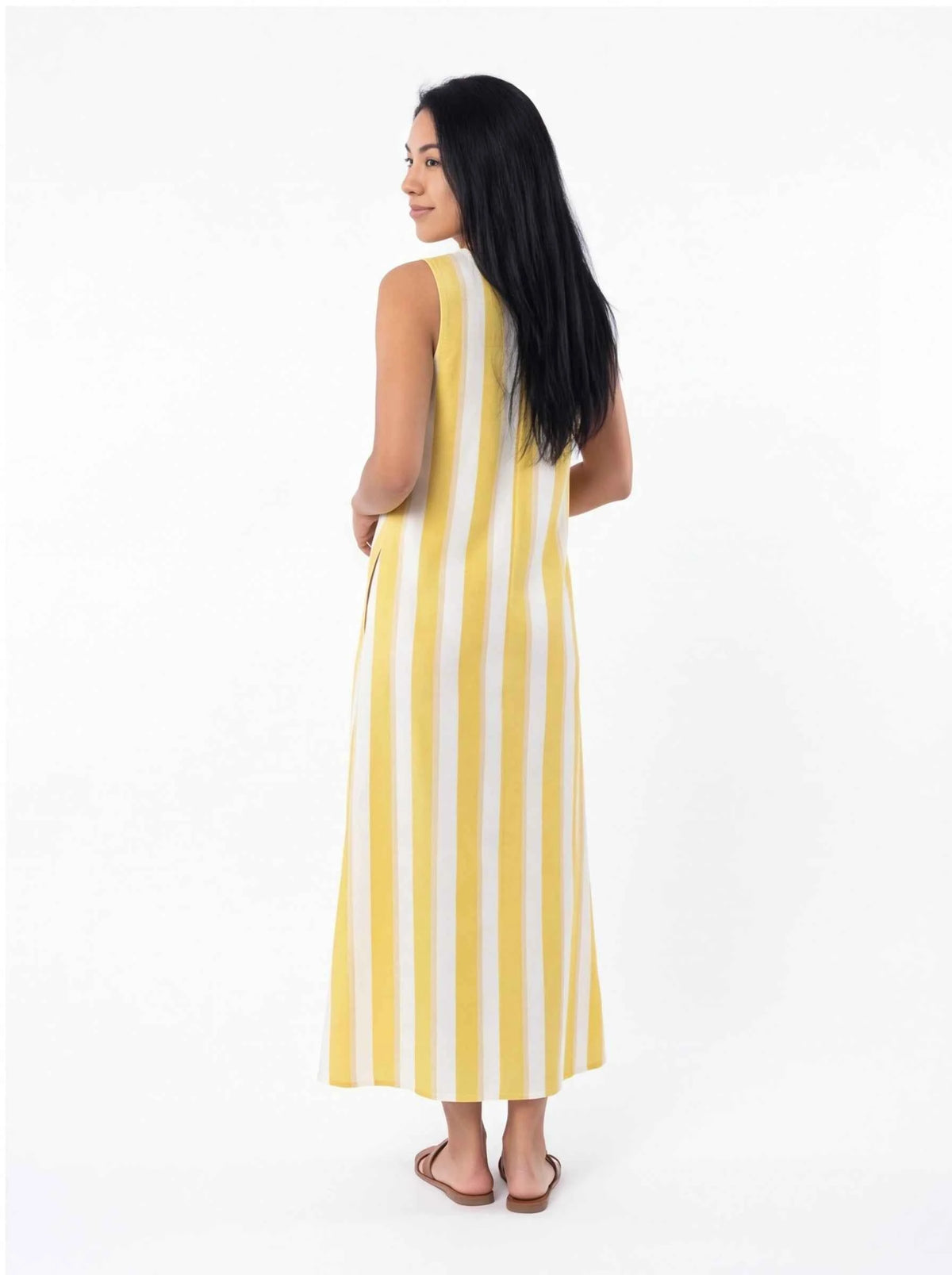 Sleeveless V-neck maxi dress with vertical yellow-and-white stripes, side/back view