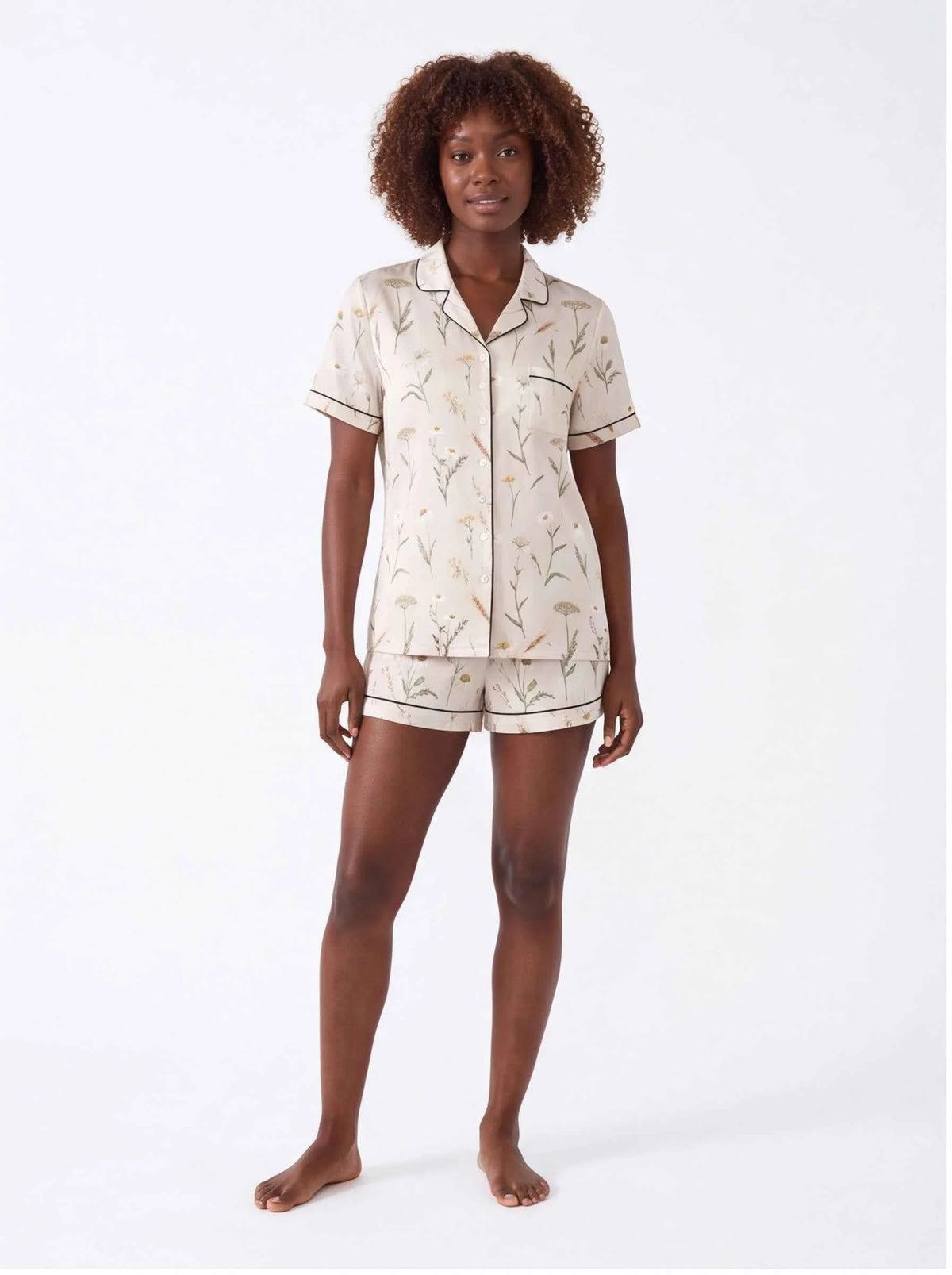 Ivory botanical satin pajama set with short-sleeve button shirt and matching shorts
