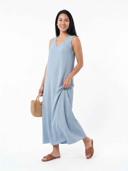 Light blue sleeveless V-neck maxi dress with side slit and relaxed fit