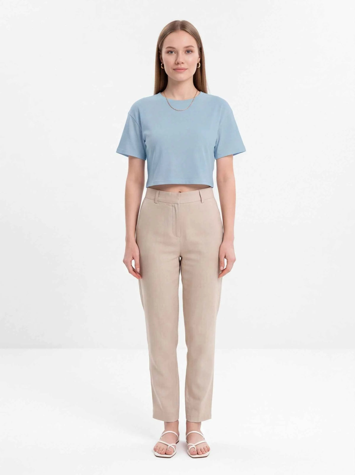 Light blue cropped women's T-shirt with short sleeves and crew neck