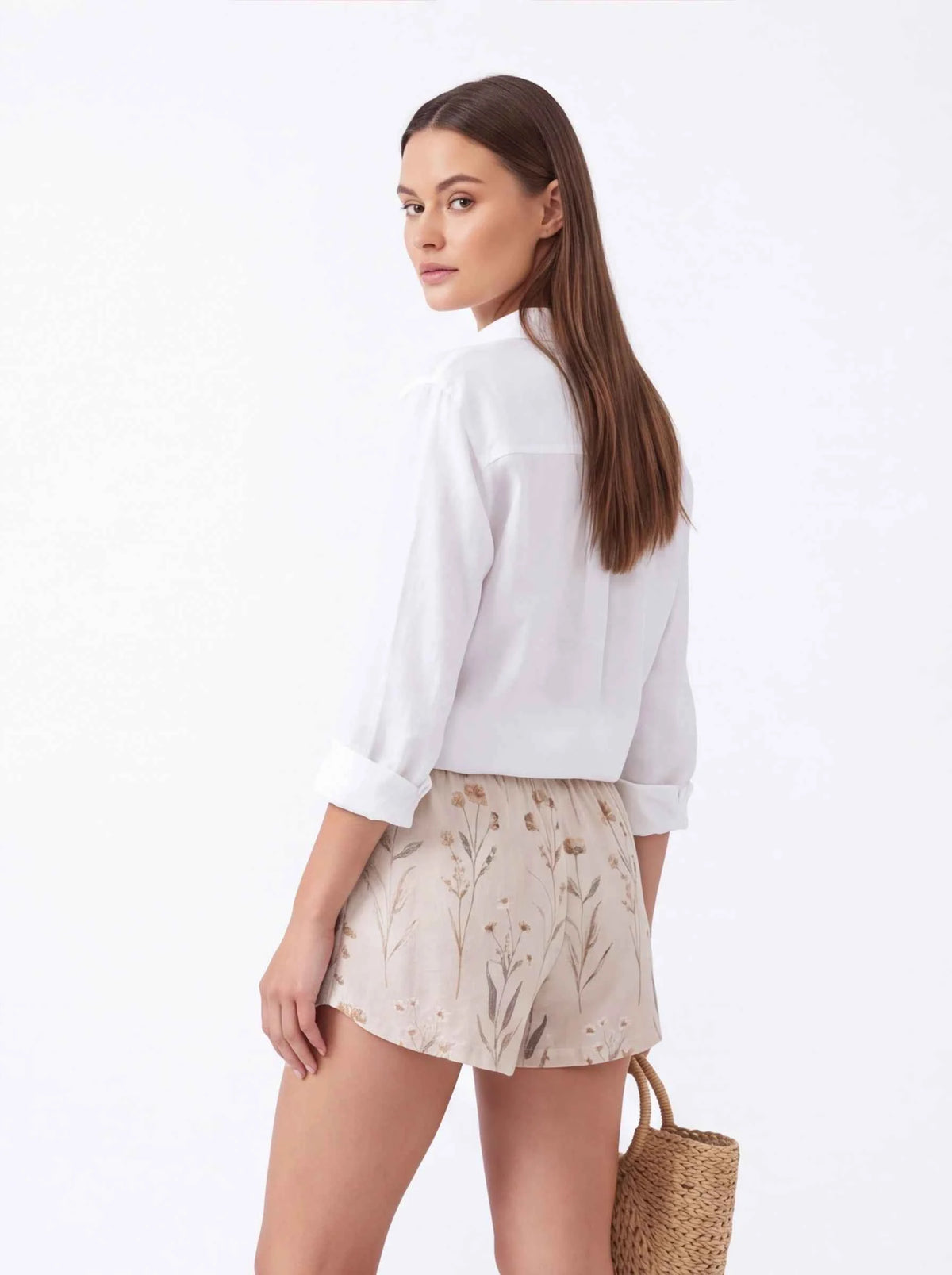 Beige floral relaxed shorts, elastic waist and drawstring (side view)