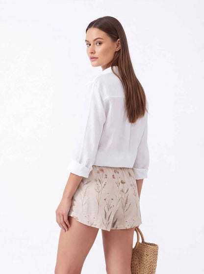 Beige floral relaxed shorts, elastic waist and drawstring (side view)