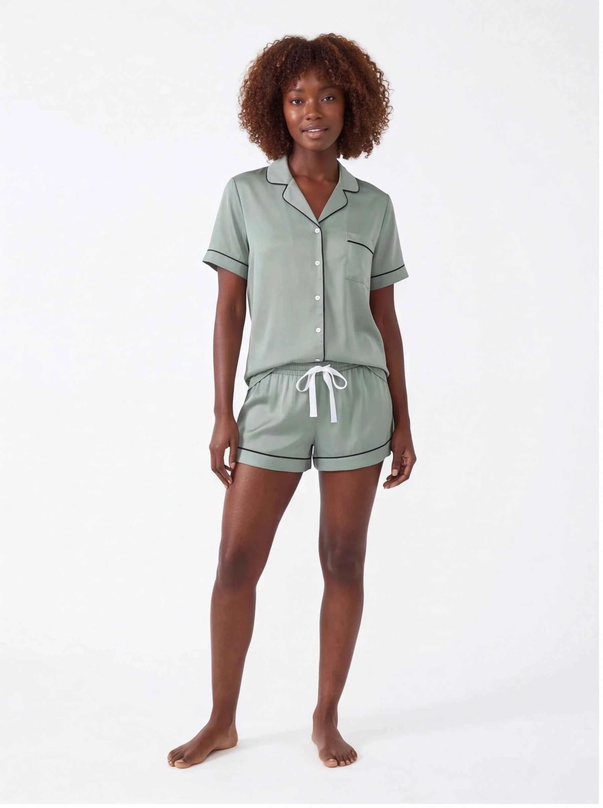 Sage green satin short-sleeve pajama set, button-up shirt and drawstring shorts