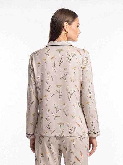 Women's satin lounge pajama set, back view with botanical print on light fabric