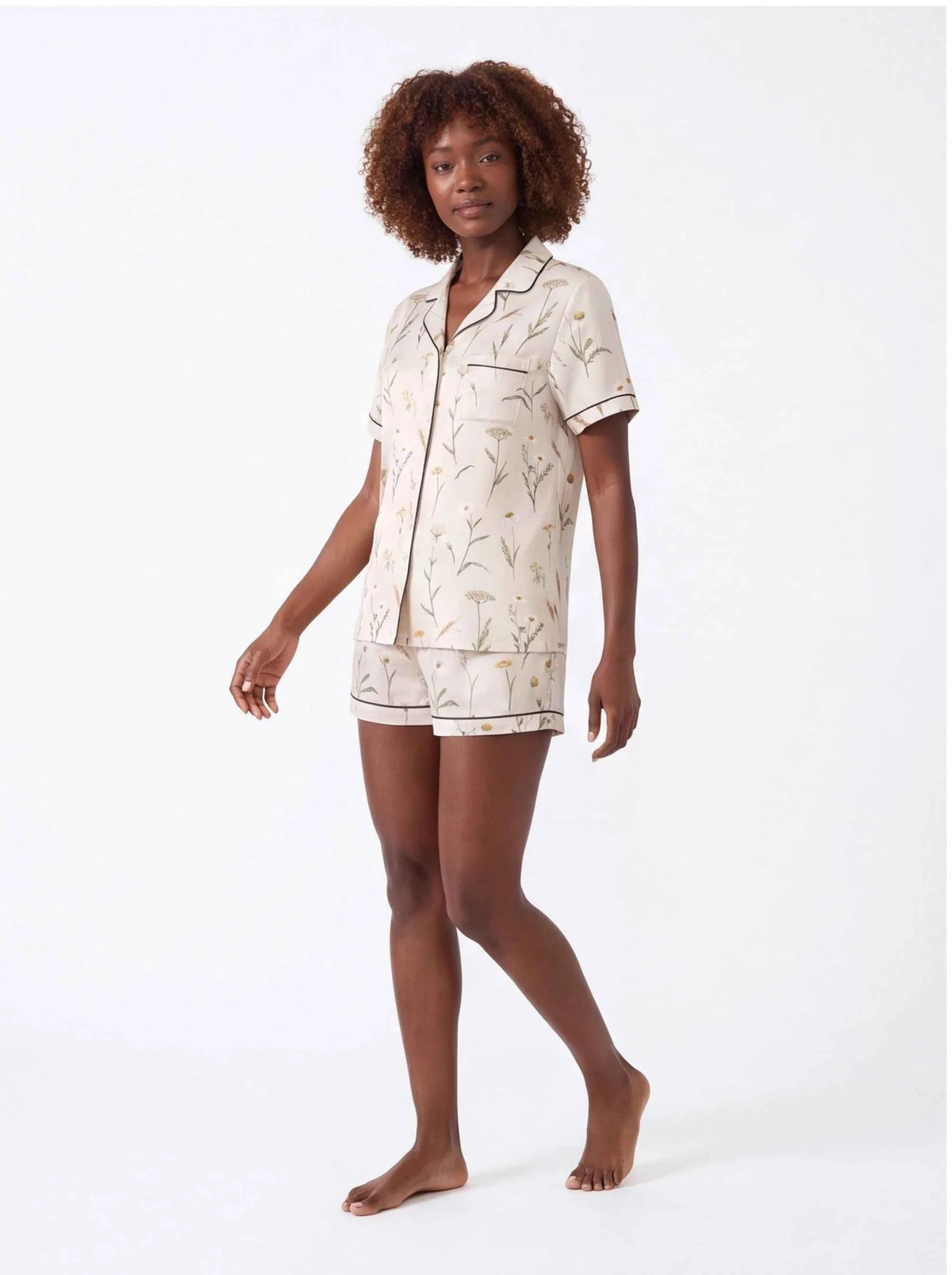 Cream botanical satin pajama set with collared short-sleeve shirt and matching shorts