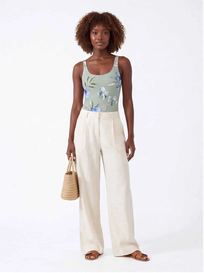 Floral one-piece swimsuit in pale blue-green with botanical print and scoop neckline
