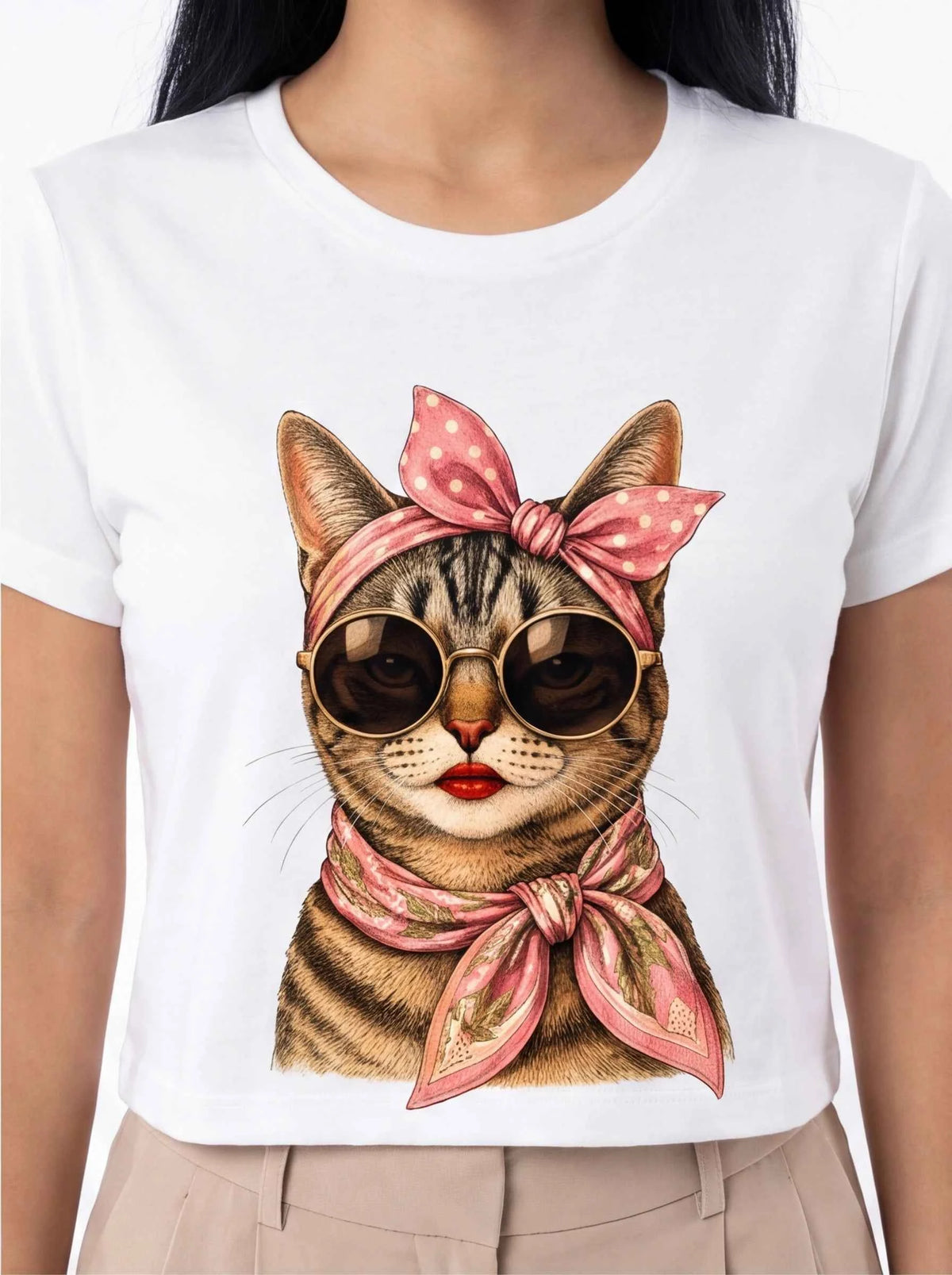 White cat graphic T-shirt with pink polka-dot bow, short sleeves