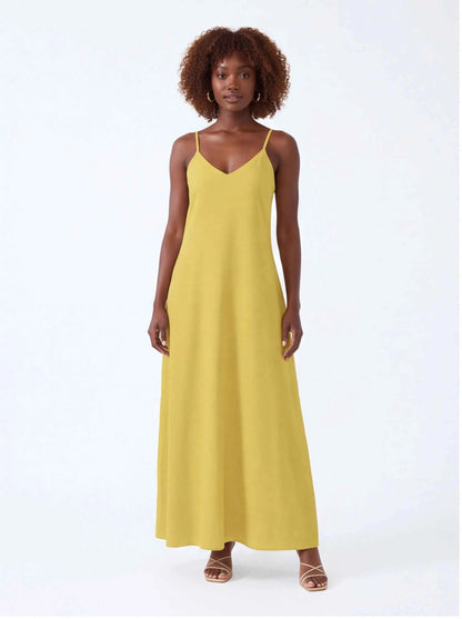 Yellow spaghetti strap maxi dress with V-neck and straight, flowing silhouette