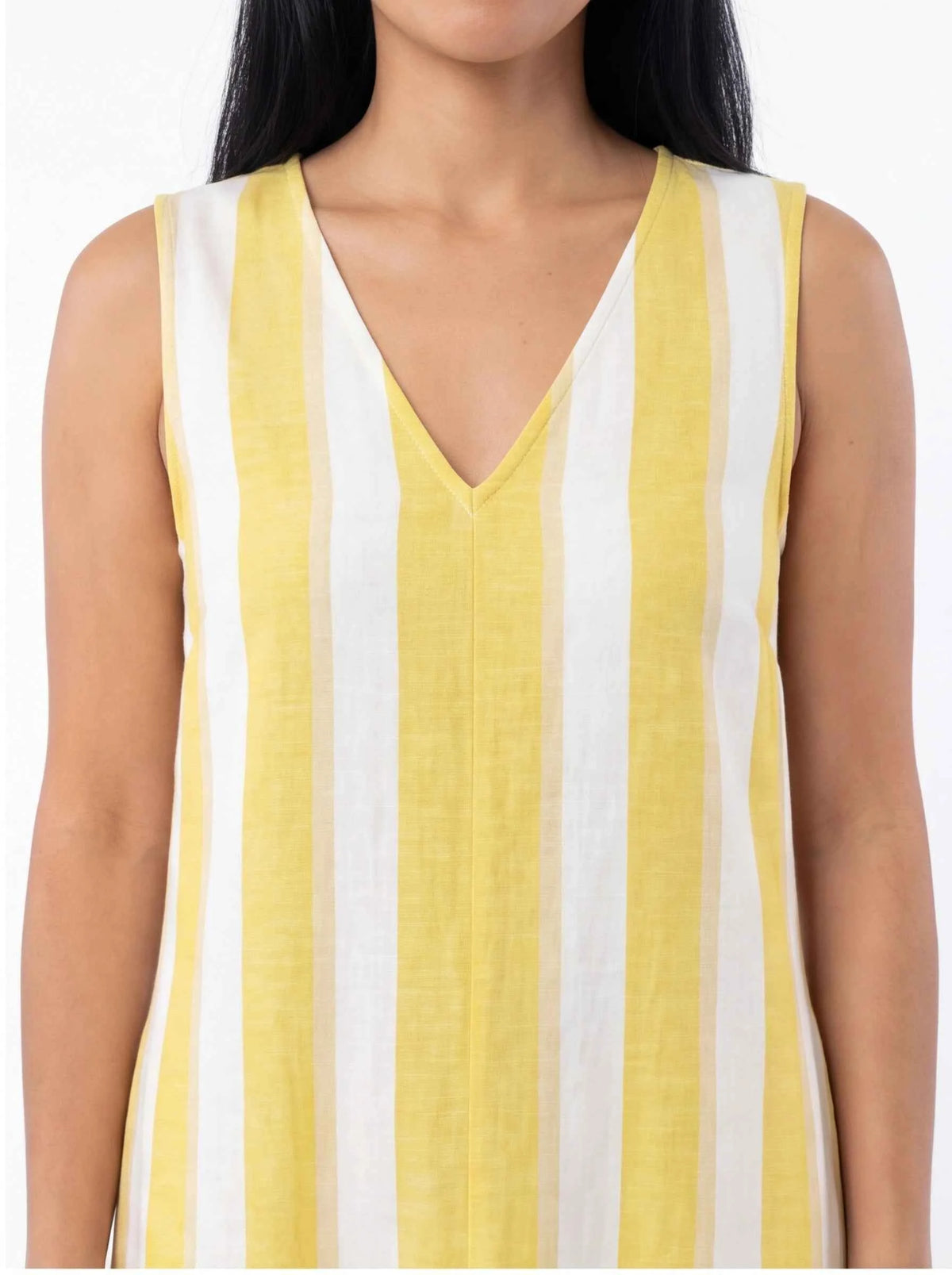Sleeveless V-neck maxi dress close-up, vertical yellow-and-white stripes