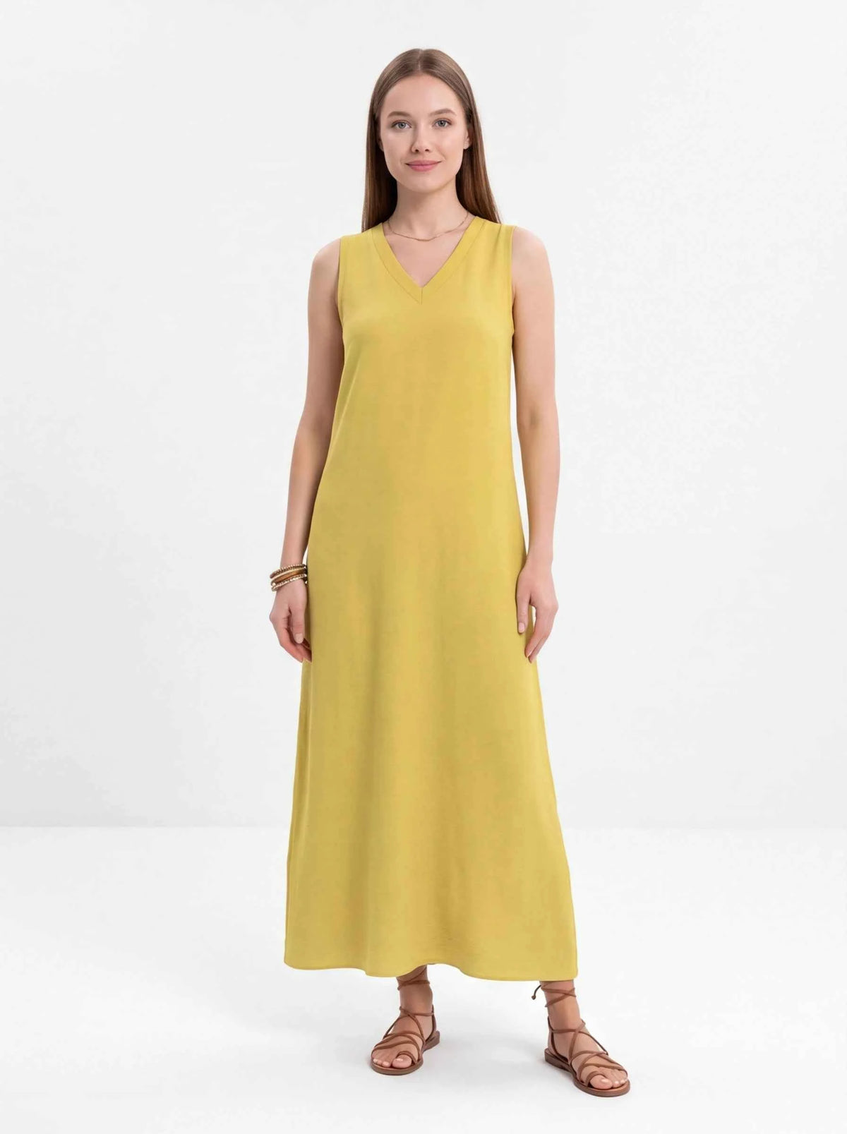 Yellow sleeveless V-neck maxi dress with flowing A-line skirt